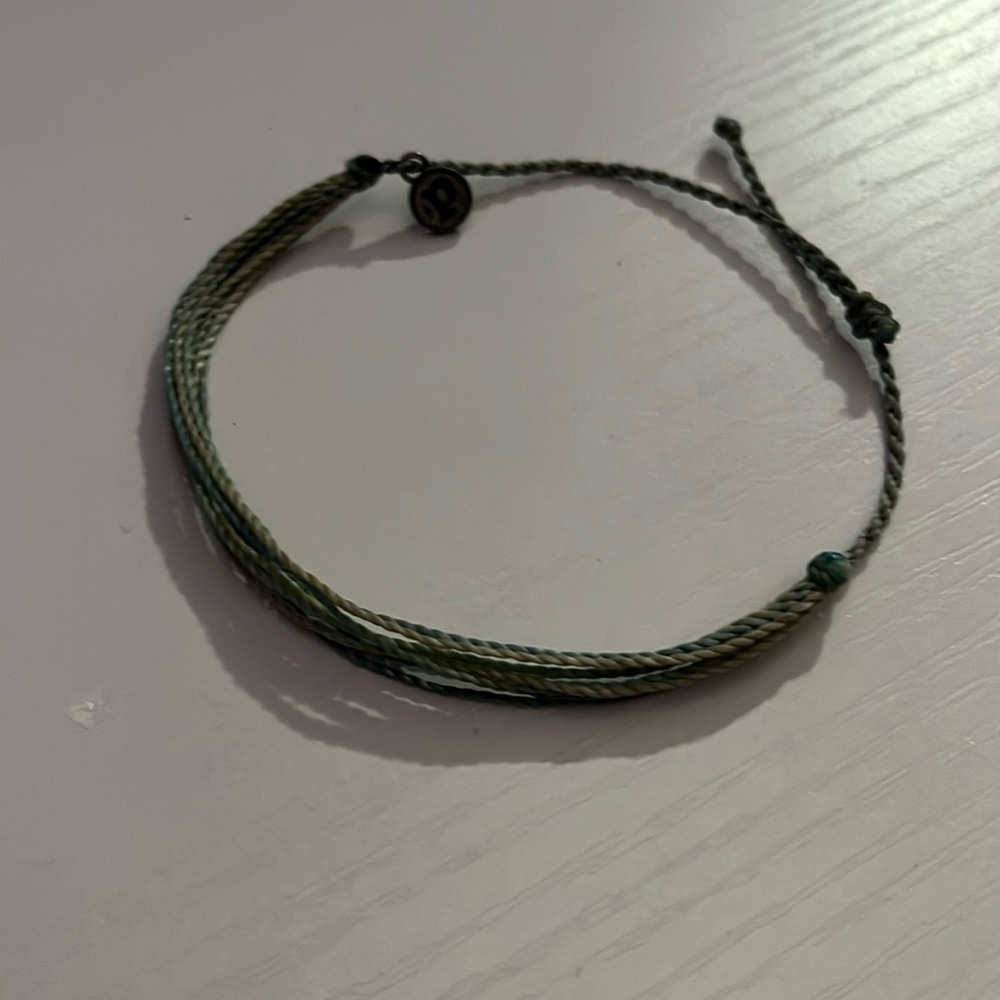 Purivida bracelets, 4 different bracelets, different colors,worn 1 time.